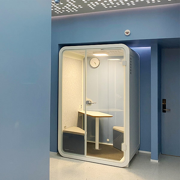 Medium white office priavcy pods placed in the hallway